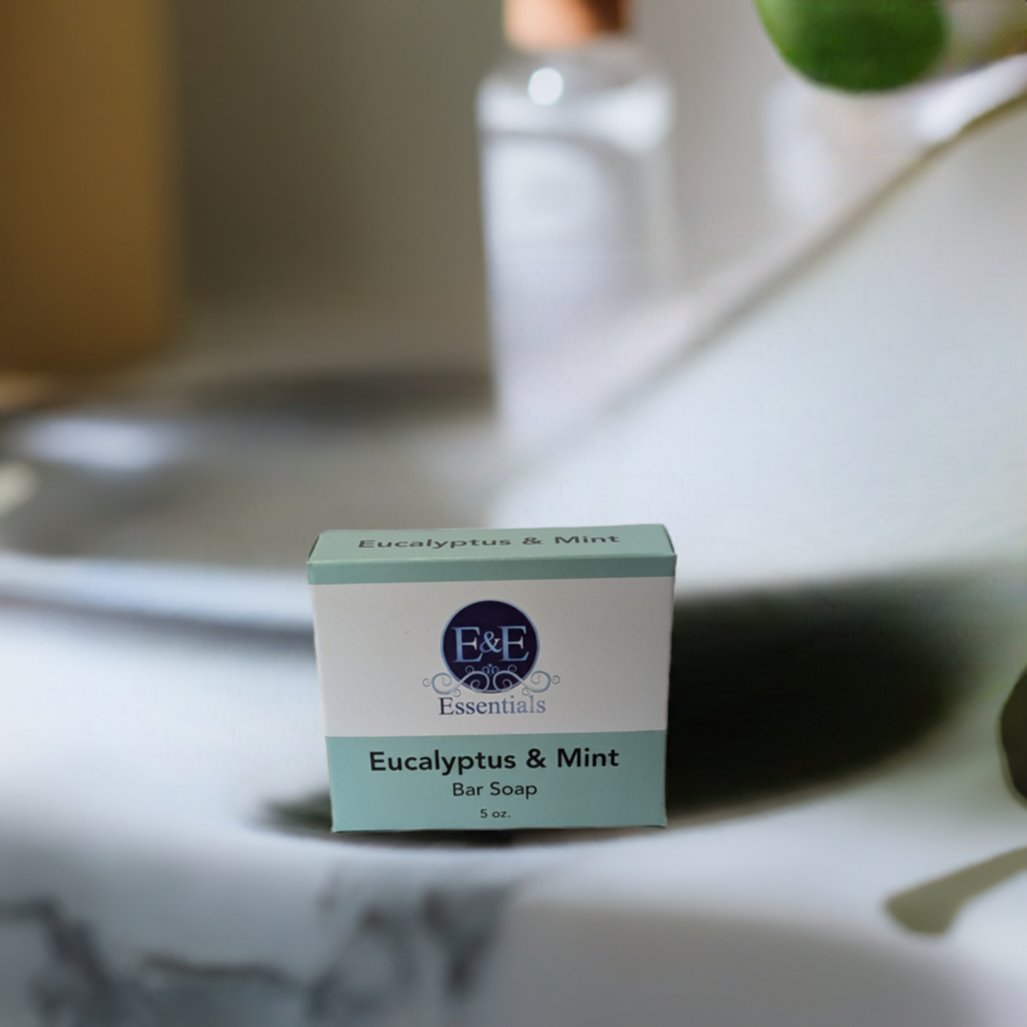 Eucalyptus &amp; Mint Bar Soap in its box, arranged on a countertop