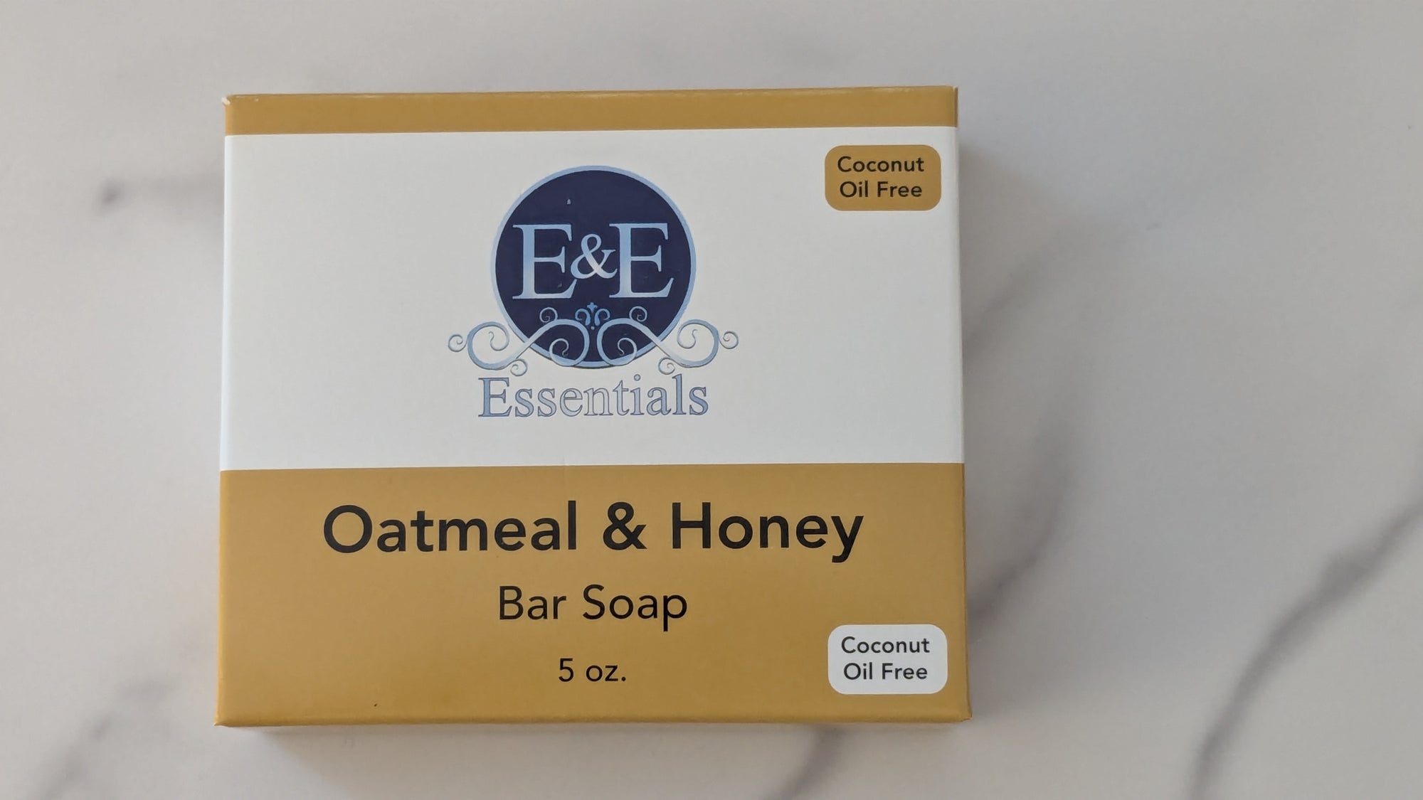 Box of E&amp;E Essentials Oatmeal &amp; Honey Bar Soap on a light gray background