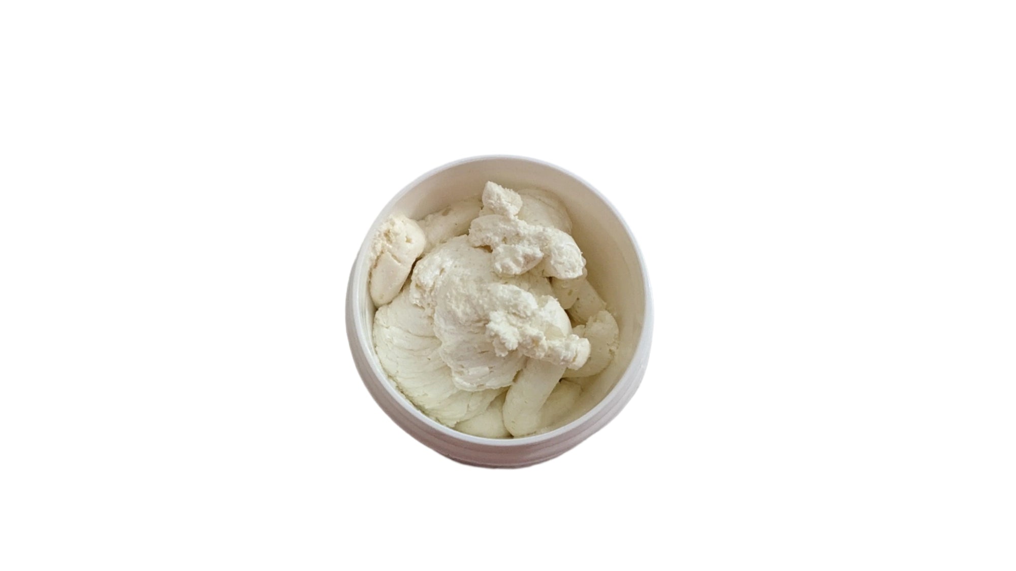 Vanilla-scented body butter in an open container on a marble surface